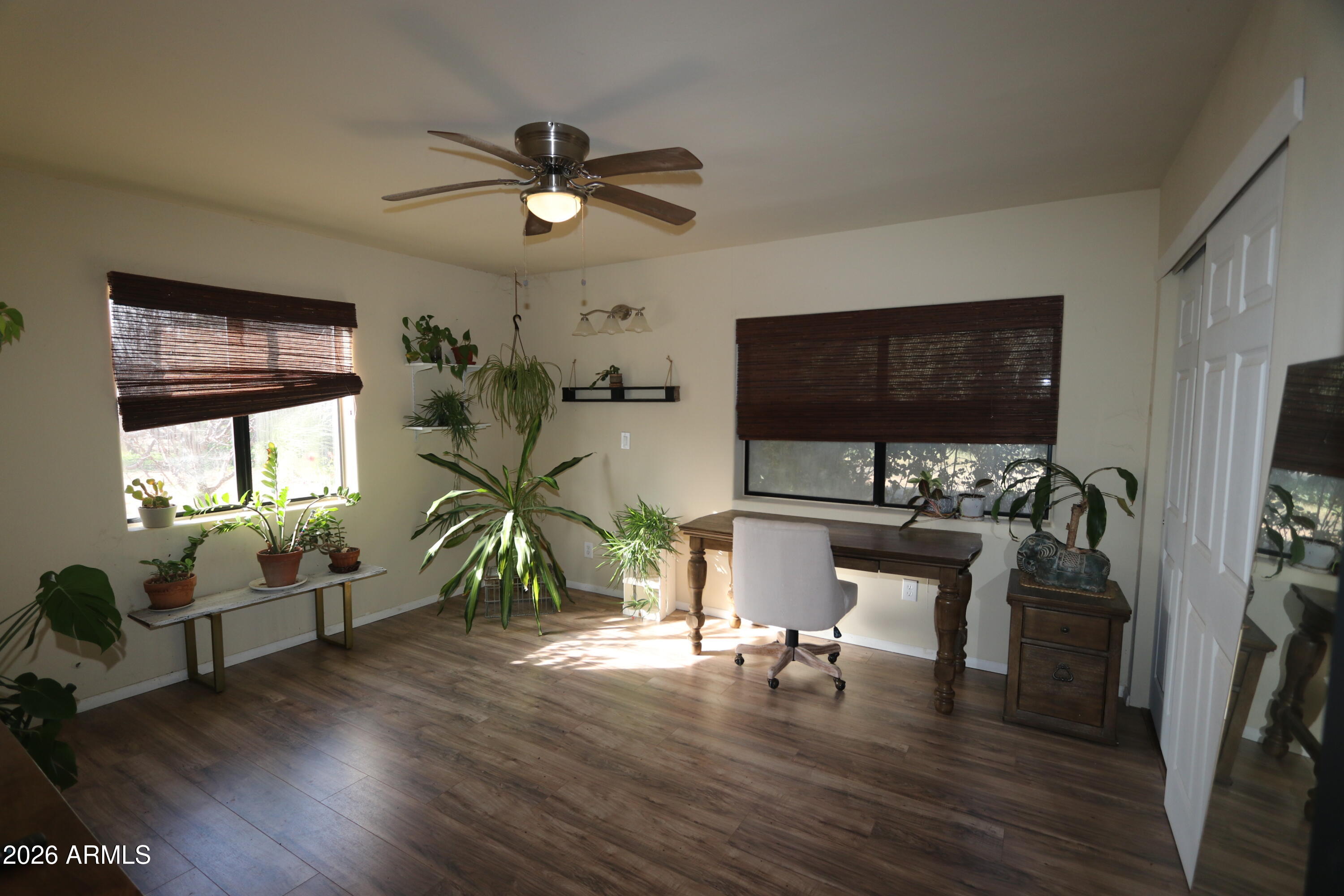 11870 Fort Grant Road Willcox, AZ 85643 - Photo 18 of 44 a living room with furniture and a flat screen tv