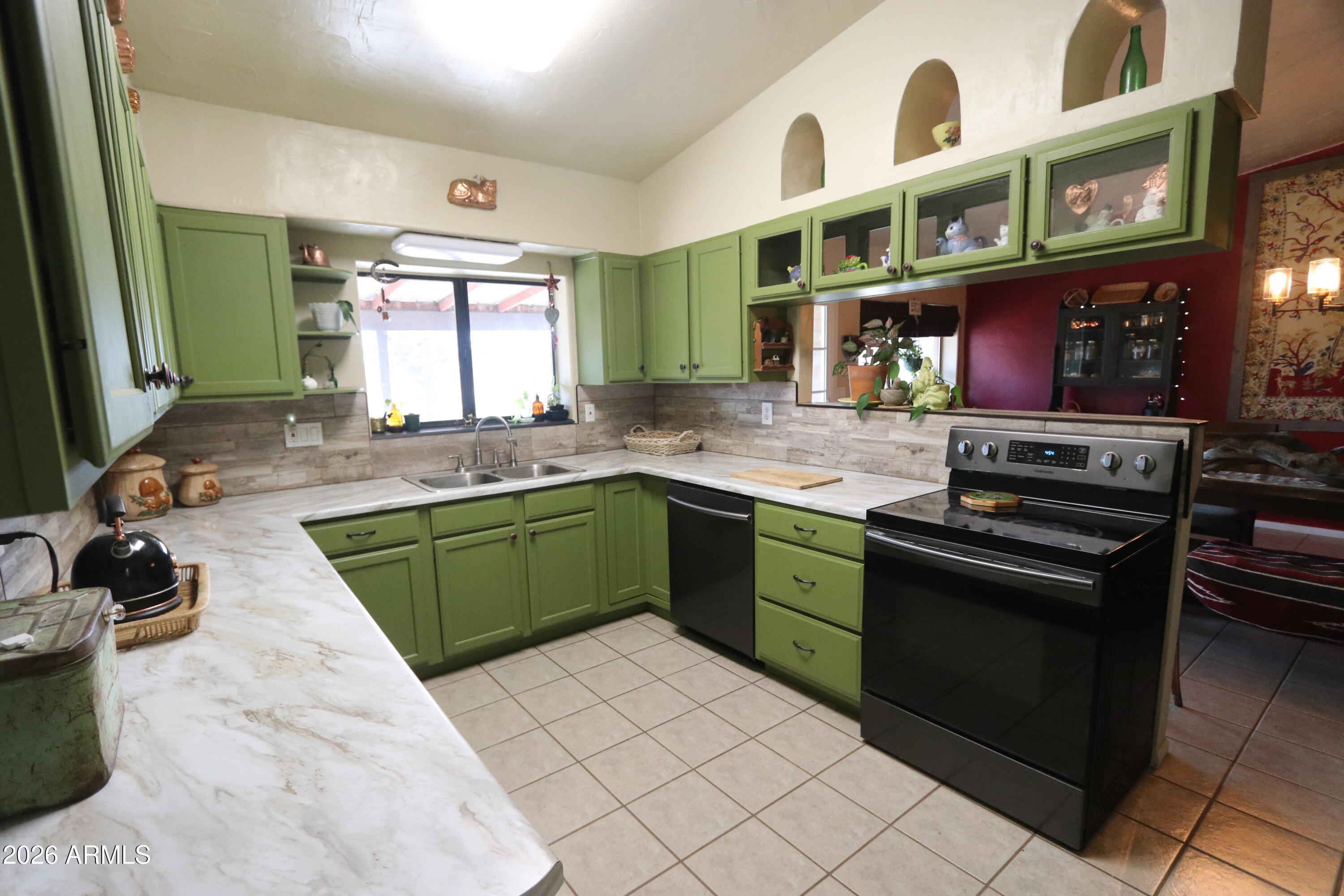 11870 Fort Grant Road Willcox, AZ 85643 - Photo 3 of 44 a kitchen with stainless steel appliances granite countertop a sink and a stove