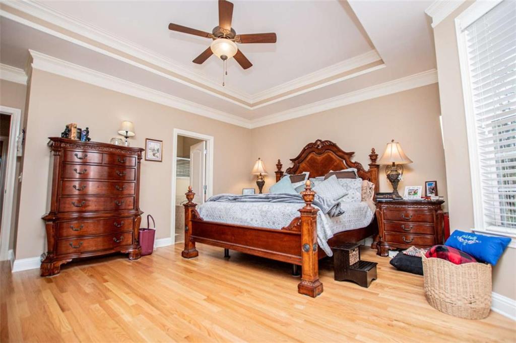 6170 Hedgestone Way Douglasville, GA 30135 - Photo 33 of 106 a bedroom with furniture and a window
