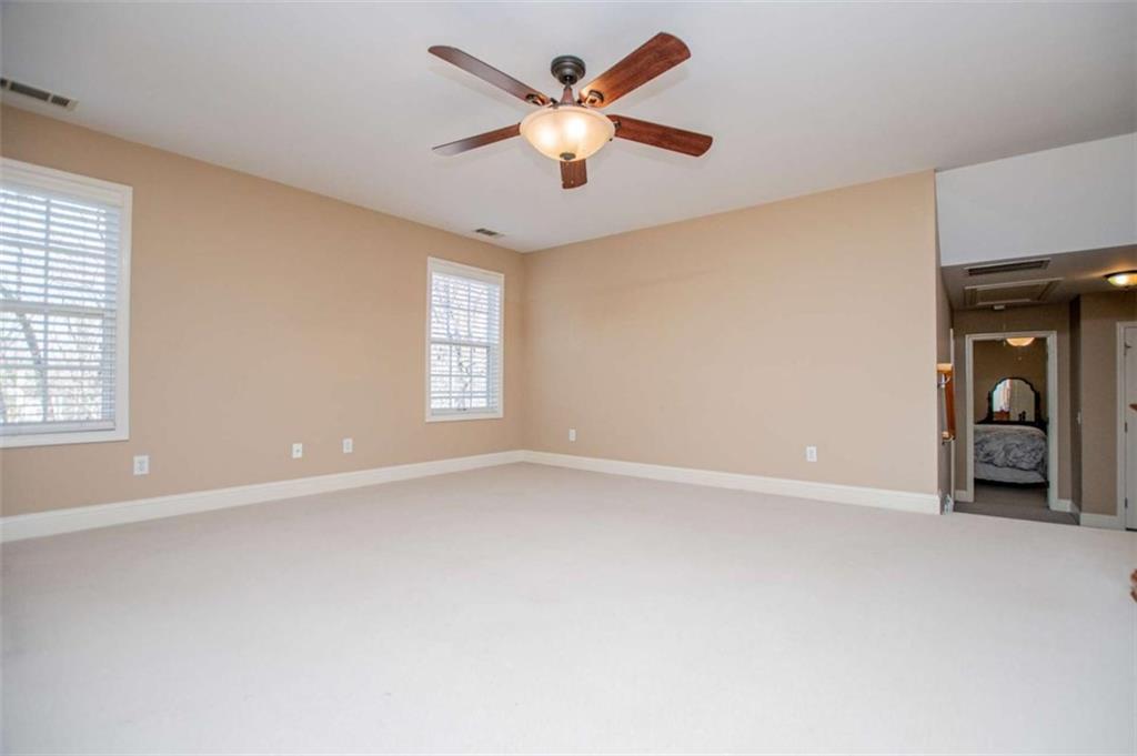6170 Hedgestone Way Douglasville, GA 30135 - Photo 50 of 106 a view of an empty room with a window