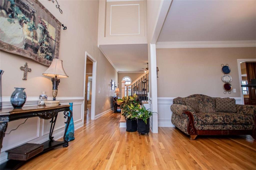 6170 Hedgestone Way Douglasville, GA 30135 - Photo 7 of 106 a living room with furniture and wooden floor