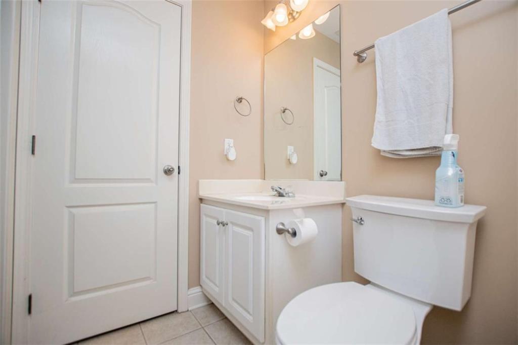 6170 Hedgestone Way Douglasville, GA 30135 - Photo 74 of 106 a bathroom with a sink a toilet a mirror and vanity
