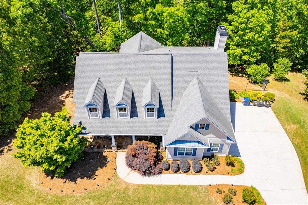 6170 Hedgestone Way Douglasville, GA 30135 - Photo 82 of 106 a aerial view of a house with a yard and potted plants