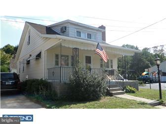 214 Church Road Rockledge, PA 19046 - Photo 2 of 10 a black and white house with a yard