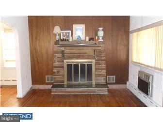 214 Church Road Rockledge, PA 19046 - Photo 6 of 10 a black and white photo of a fireplace