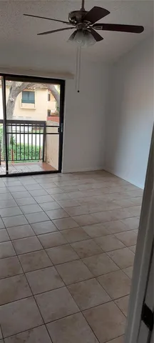 a view of a livingroom with a large window