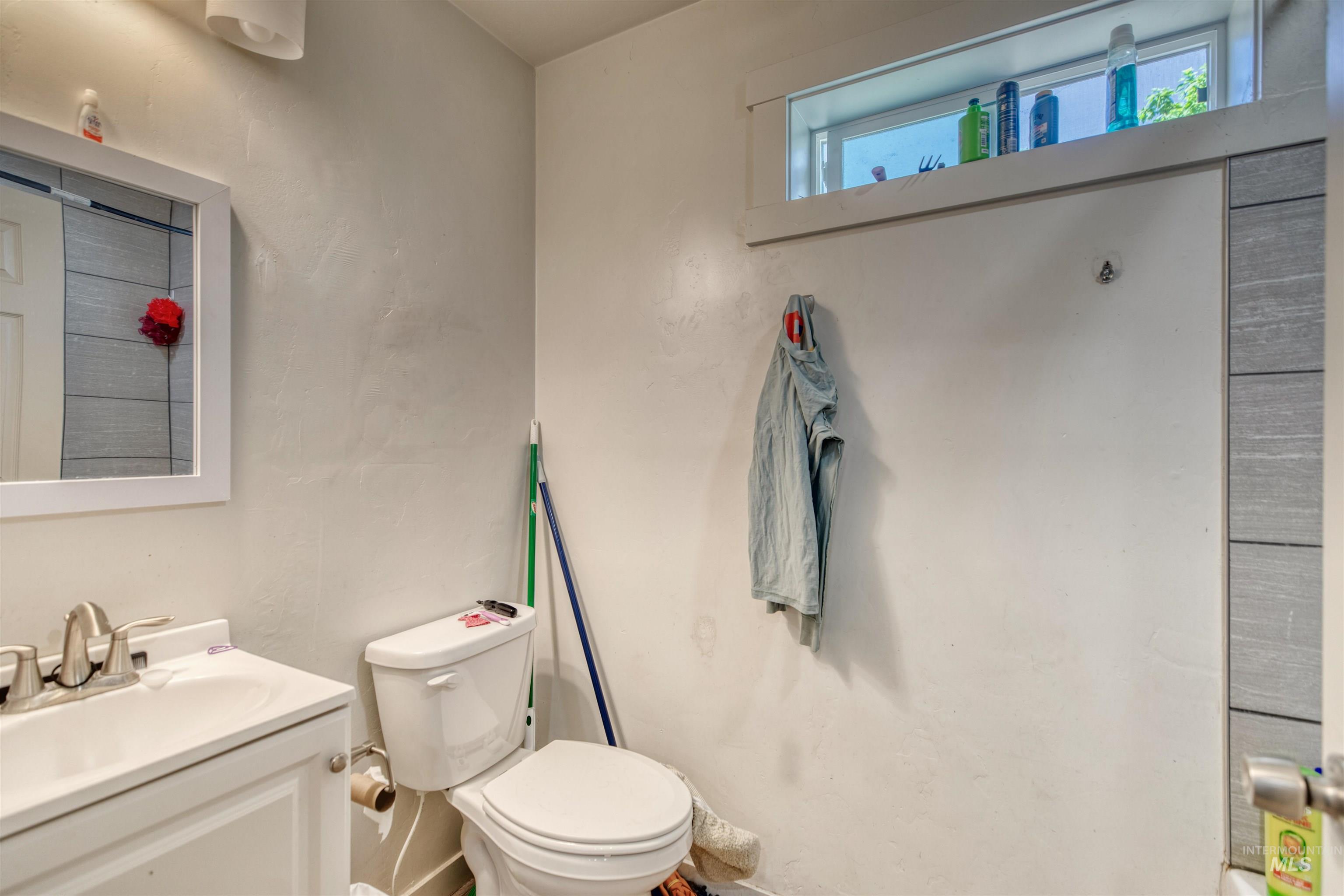 110 East Main Street Nyssa, OR 97913 - Photo 6 of 17 Bathroom with vanity and toilet