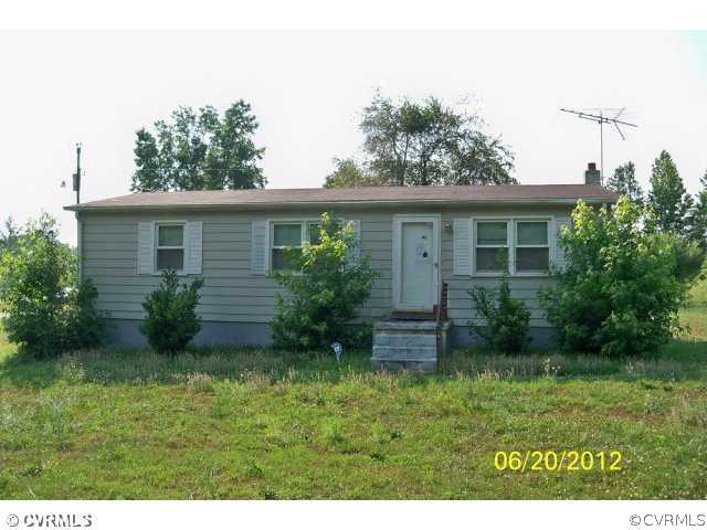 2231 Mountain Hall Road Crewe, VA 23930 - Photo 1 of 6 a view of house with backyard and garden