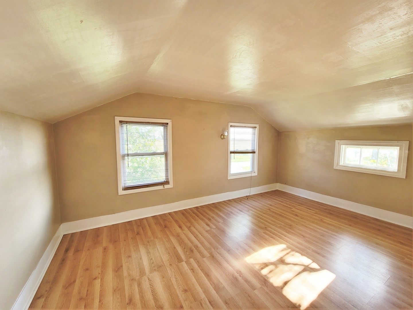 6932 Randall Road Poplar Grove, IL 61065 - Photo 13 of 44 an empty room with wooden floor and windows