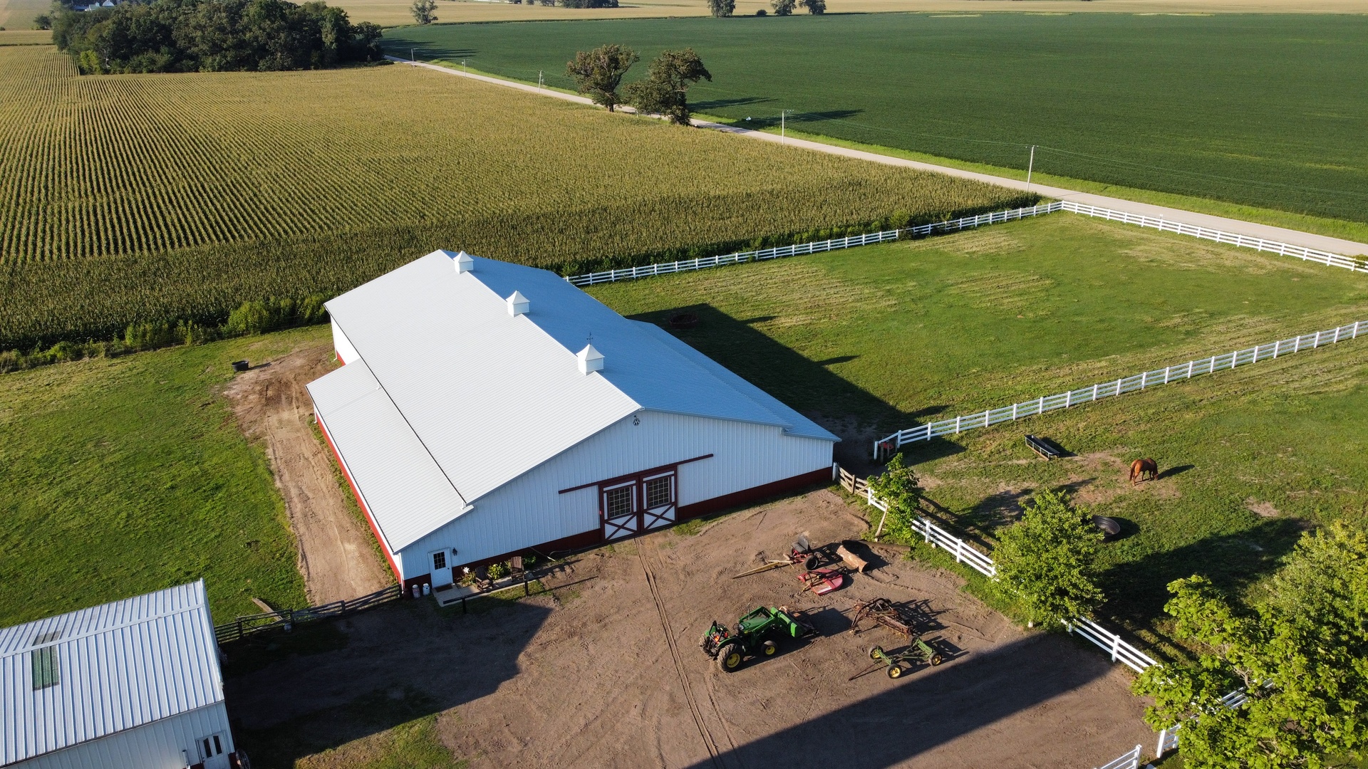 6932 Randall Road Poplar Grove, IL 61065 - Photo 2 of 44 an aerial view of a house with a yard