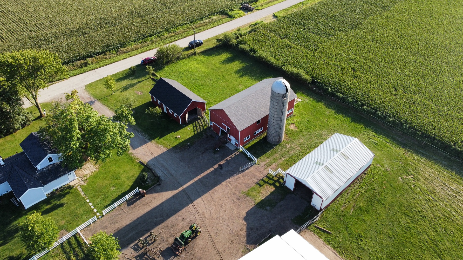 6932 Randall Road Poplar Grove, IL 61065 - Photo 36 of 44 an aerial view of a house with a garden and lake view