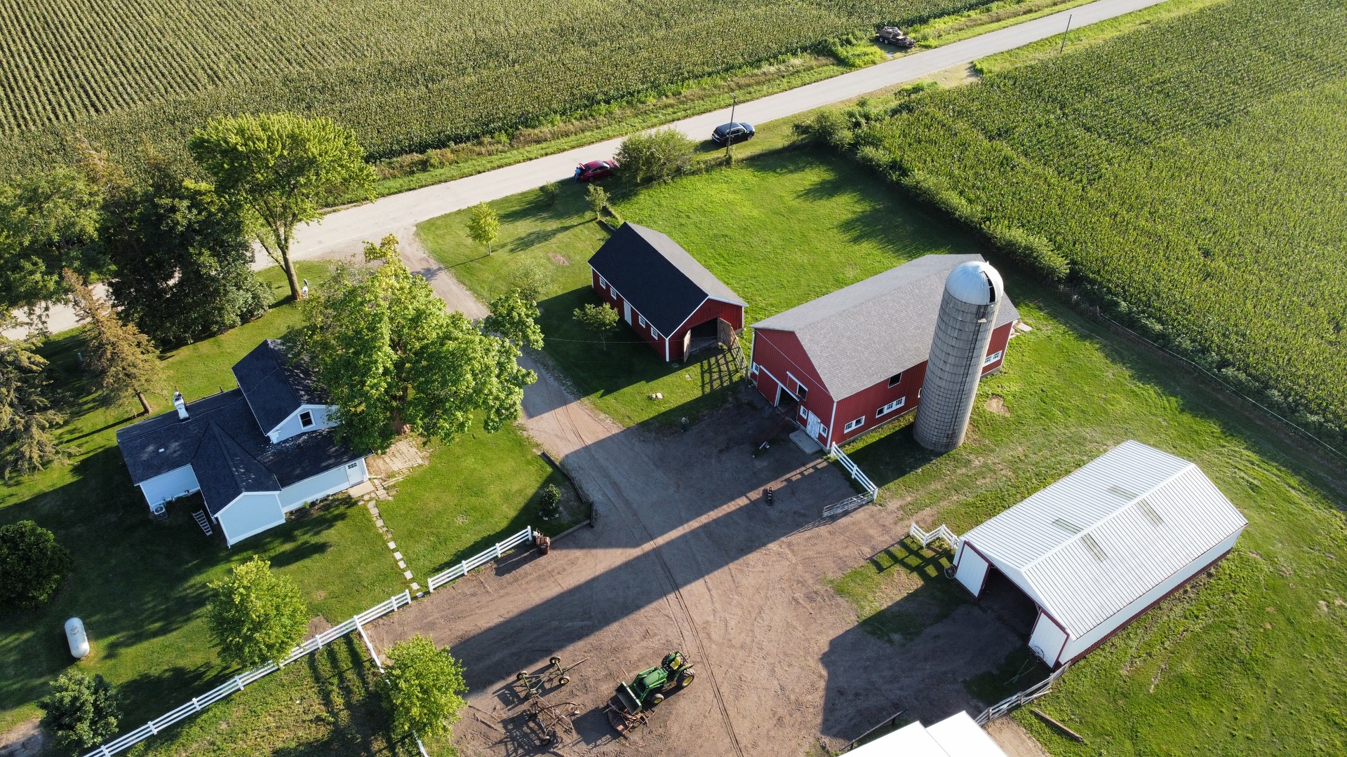 6932 Randall Road Poplar Grove, IL 61065 - Photo 37 of 44 an aerial view of a house with a garden and lake view