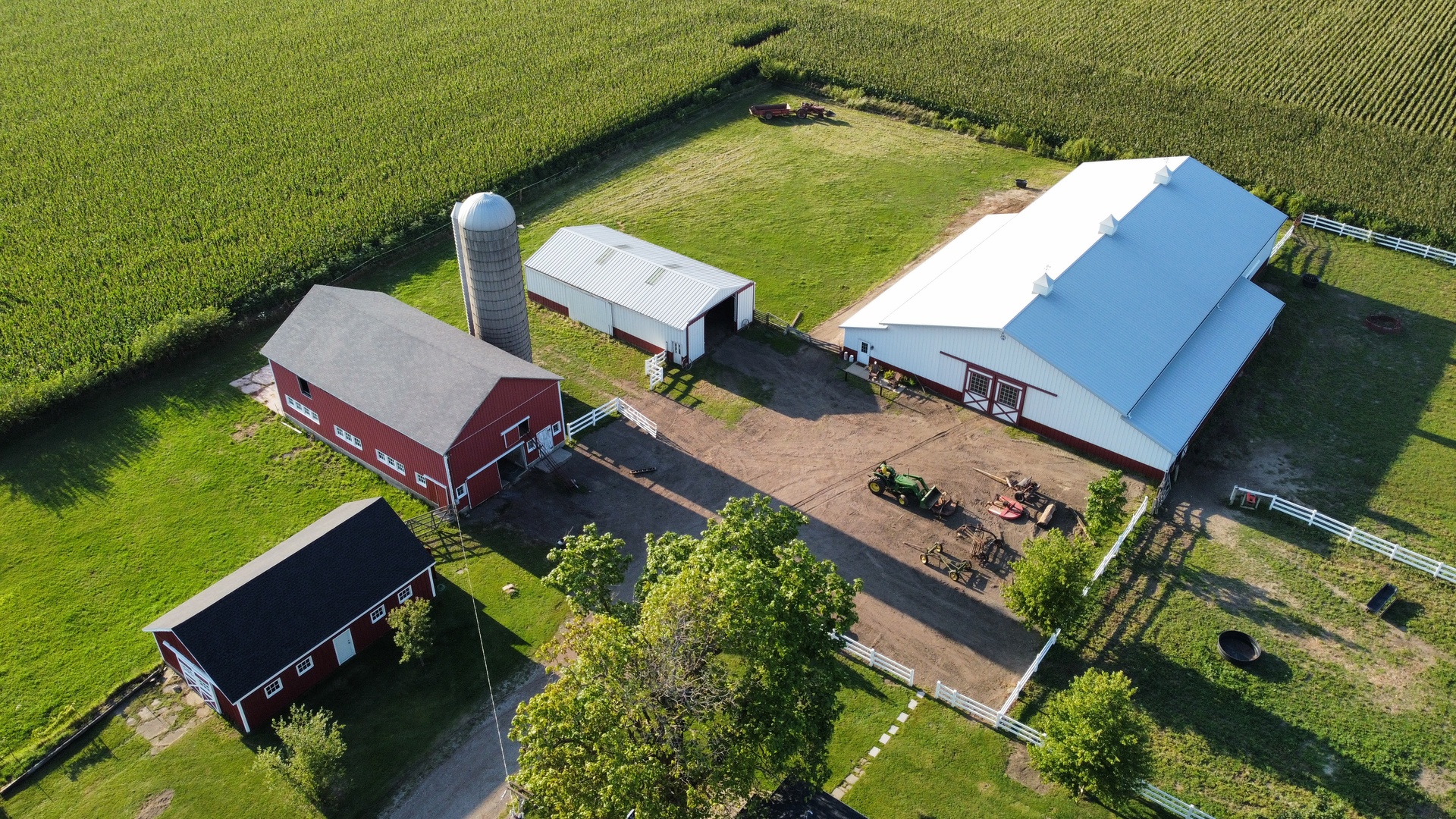 6932 Randall Road Poplar Grove, IL 61065 - Photo 41 of 44 an aerial view of a house with a garden and lake view