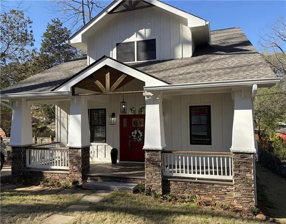 a front view of a house with porch