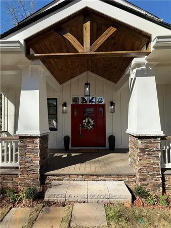a front view of a house with garage
