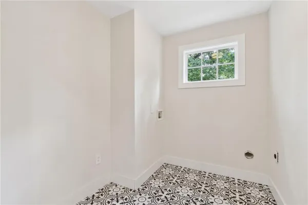 a bedroom with a bed and a table