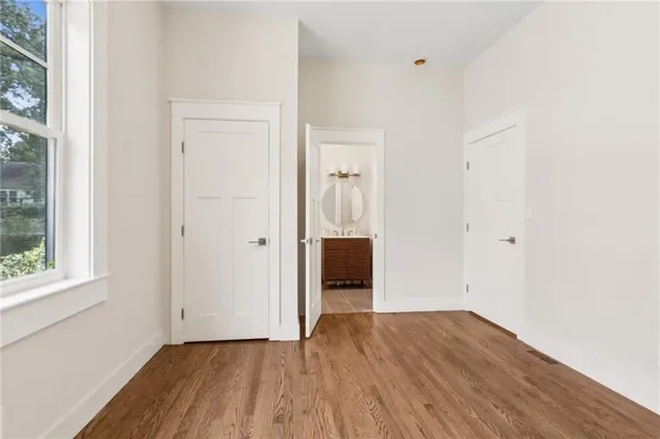 a view of balcony with wooden floor