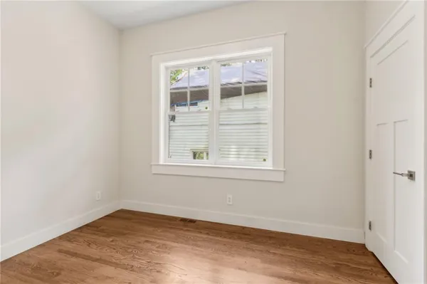 a view of a house with a tree