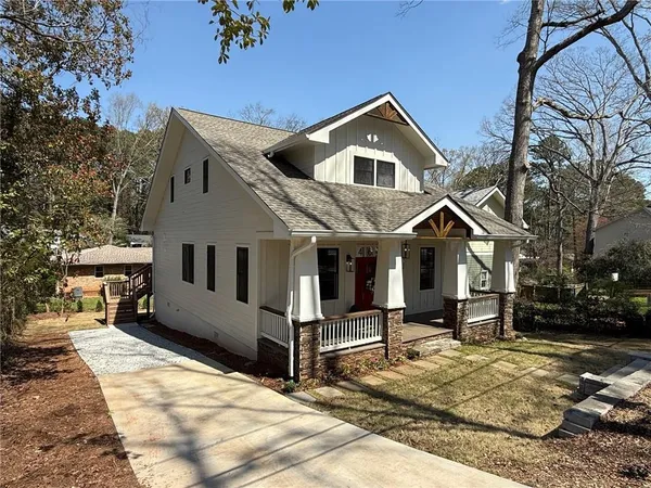a view of a porch with wooden floor and outdoor space