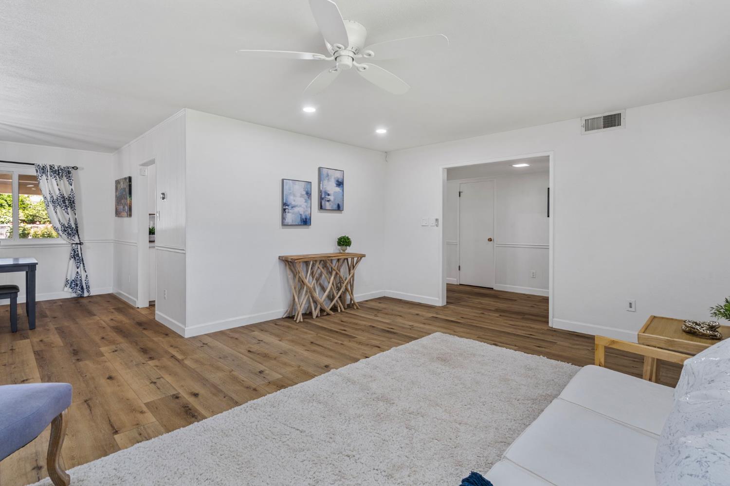 2433 Broadridge Way Stockton, CA 95209 - Photo 14 of 67 a spacious bedroom with a bed and a dresser