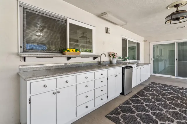 an aerial view of a house with a garden