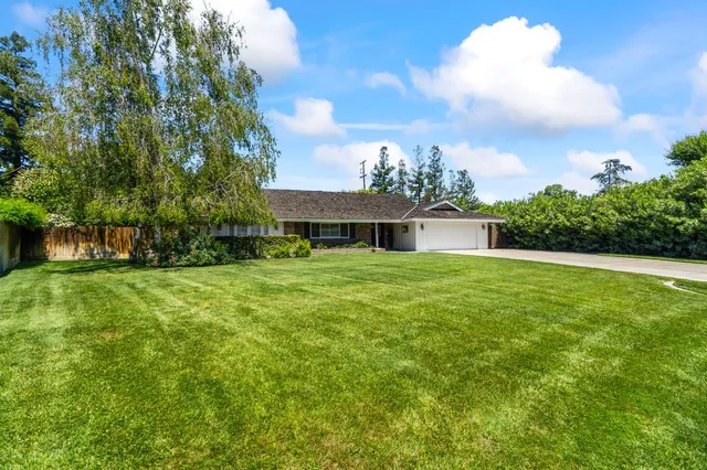 front view of house with a yard
