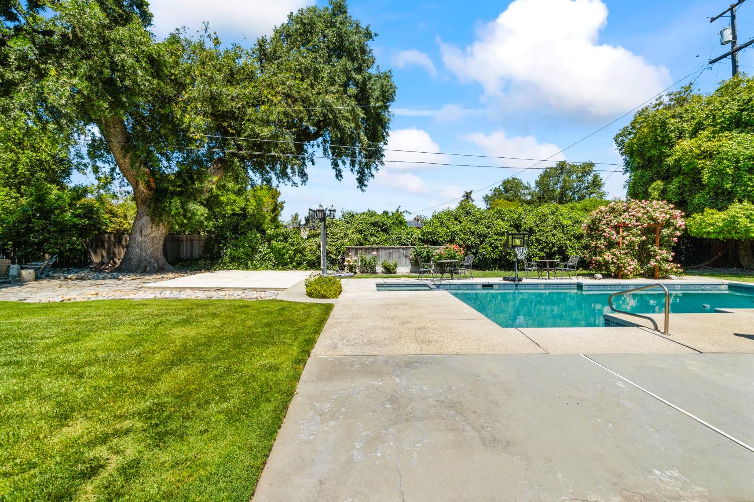 2433 Broadridge Way Stockton, CA 95209 - Photo 51 of 67 a view of swimming pool with a yard