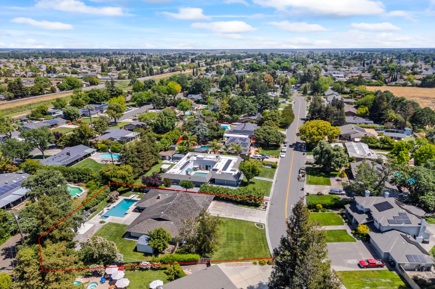 2433 Broadridge Way Stockton, CA 95209 - Photo 64 of 67 an aerial view of a city with lots of residential buildings
