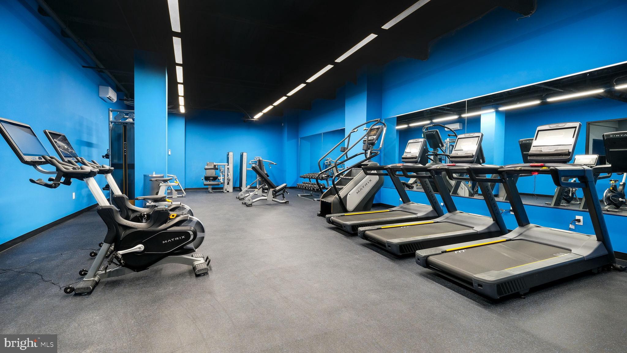 1825 Callowhill Street, Unit 511 Philadelphia, PA 19130 - Photo 32 of 50 a view of a room with gym equipment