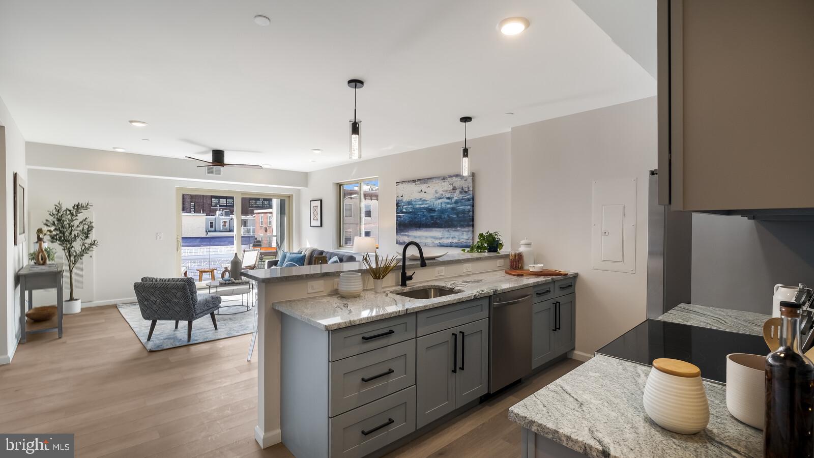 1825 Callowhill Street, Unit 511 Philadelphia, PA 19130 - Photo 4 of 50 a kitchen with a stove and cabinets