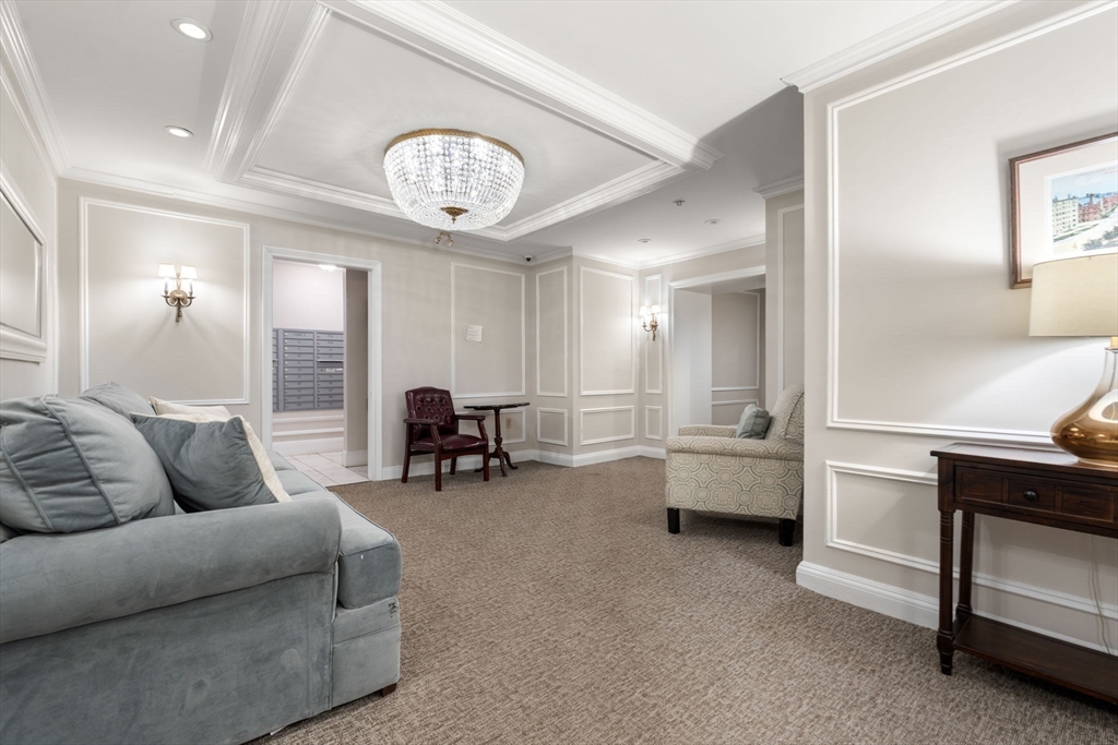 362 Commonwealth Avenue, Unit 6D Boston, MA 02115 - Photo 11 of 15 a living room with furniture and a large window
