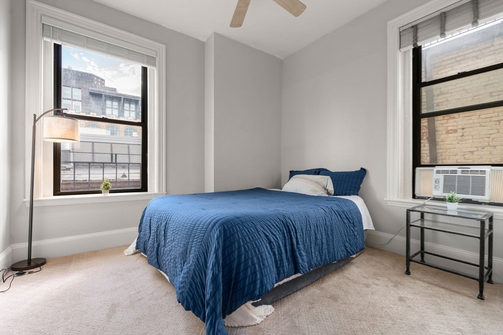 362 Commonwealth Avenue, Unit 6D Boston, MA 02115 - Photo 7 of 15 a bedroom with a bed next to a window