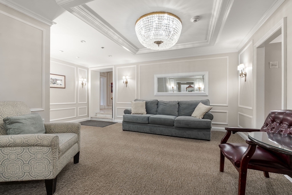 362 Commonwealth Avenue, Unit 6D Boston, MA 02115 - Photo 10 of 15 a living room with furniture a dining table and a window