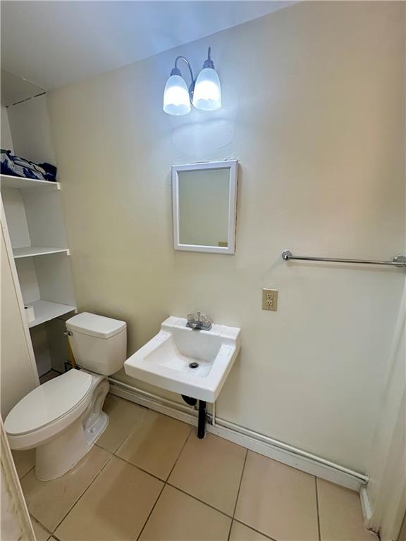 1023 Burtner Road Natrona Heights, PA 15065 - Photo 14 of 33 a bathroom with a toilet and a sink