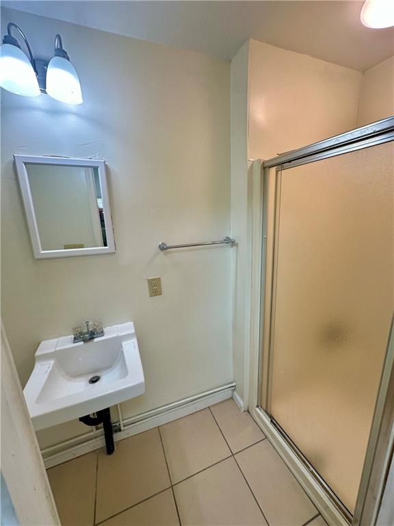 1023 Burtner Road Natrona Heights, PA 15065 - Photo 15 of 33 a bathroom with a sink and a mirror