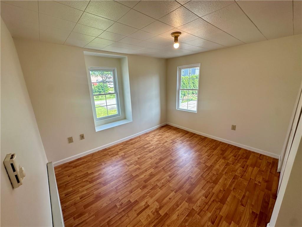 1023 Burtner Road Natrona Heights, PA 15065 - Photo 21 of 33 a view of empty room with wooden floor and fan