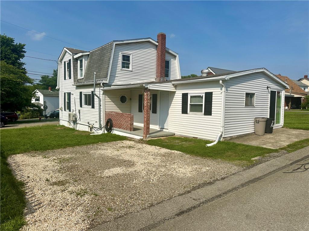 1023 Burtner Road Natrona Heights, PA 15065 - Photo 28 of 33 a front view of a house with a yard