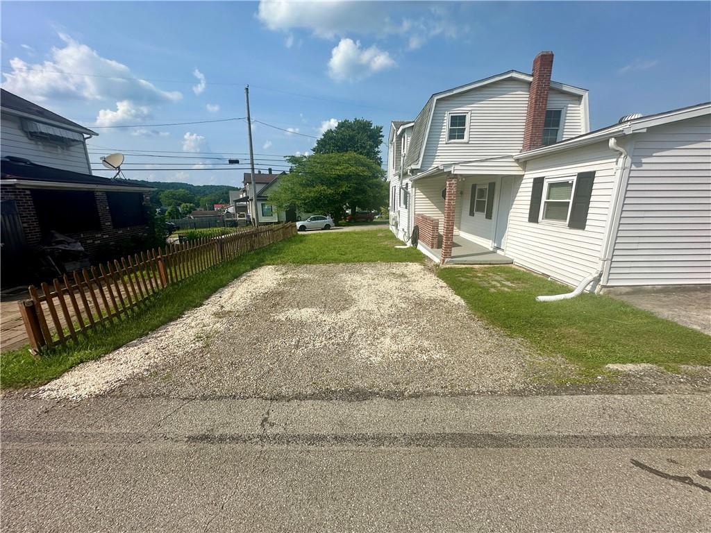1023 Burtner Road Natrona Heights, PA 15065 - Photo 33 of 33 a view of a house with a yard