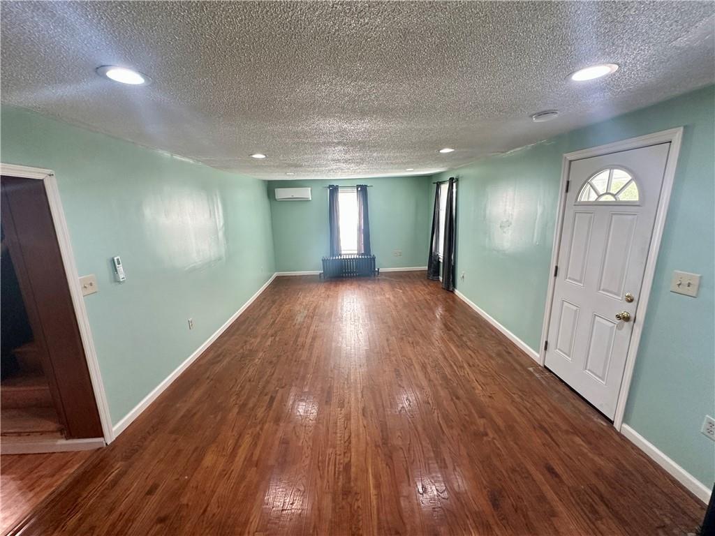 1023 Burtner Road Natrona Heights, PA 15065 - Photo 4 of 33 a view of a hallway with wooden floor