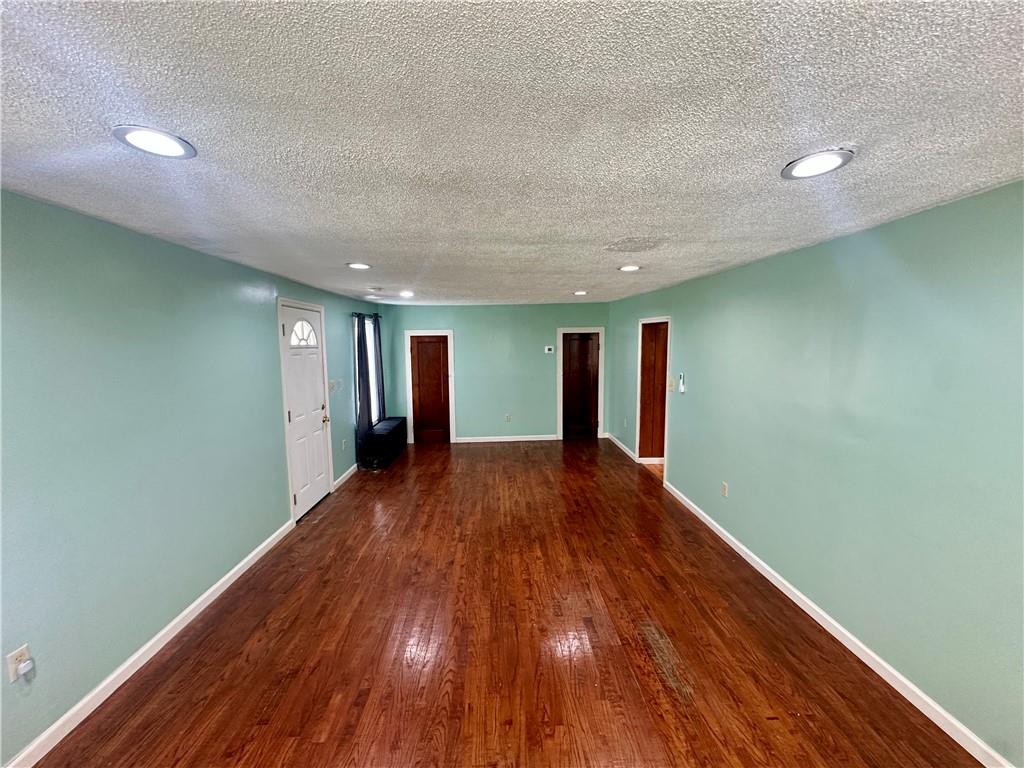 1023 Burtner Road Natrona Heights, PA 15065 - Photo 6 of 33 a view of empty room with wooden floor