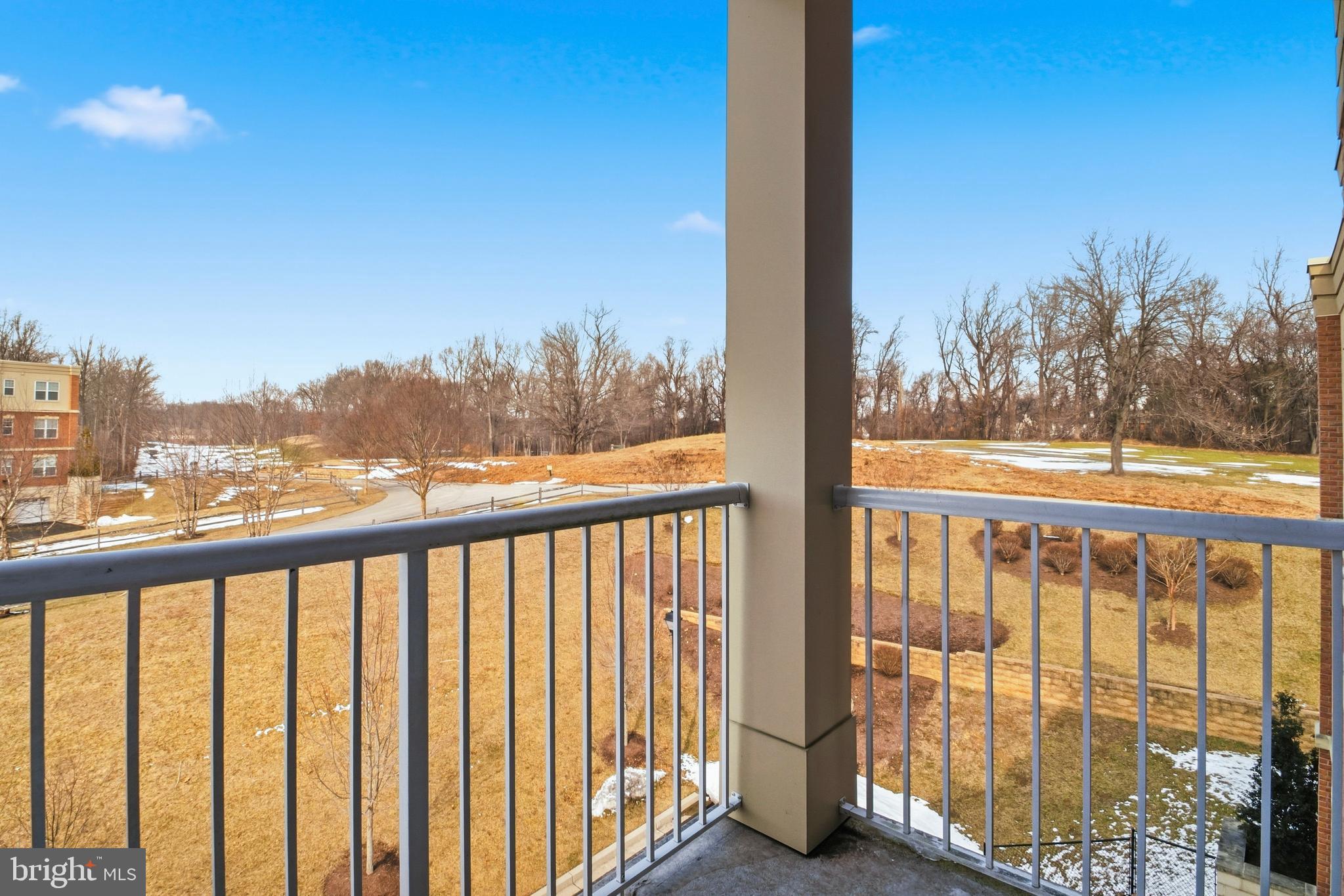 10520 Resort Road, Unit 303 Ellicott City, MD 21042 - Photo 10 of 11 a view of a balcony with furniture
