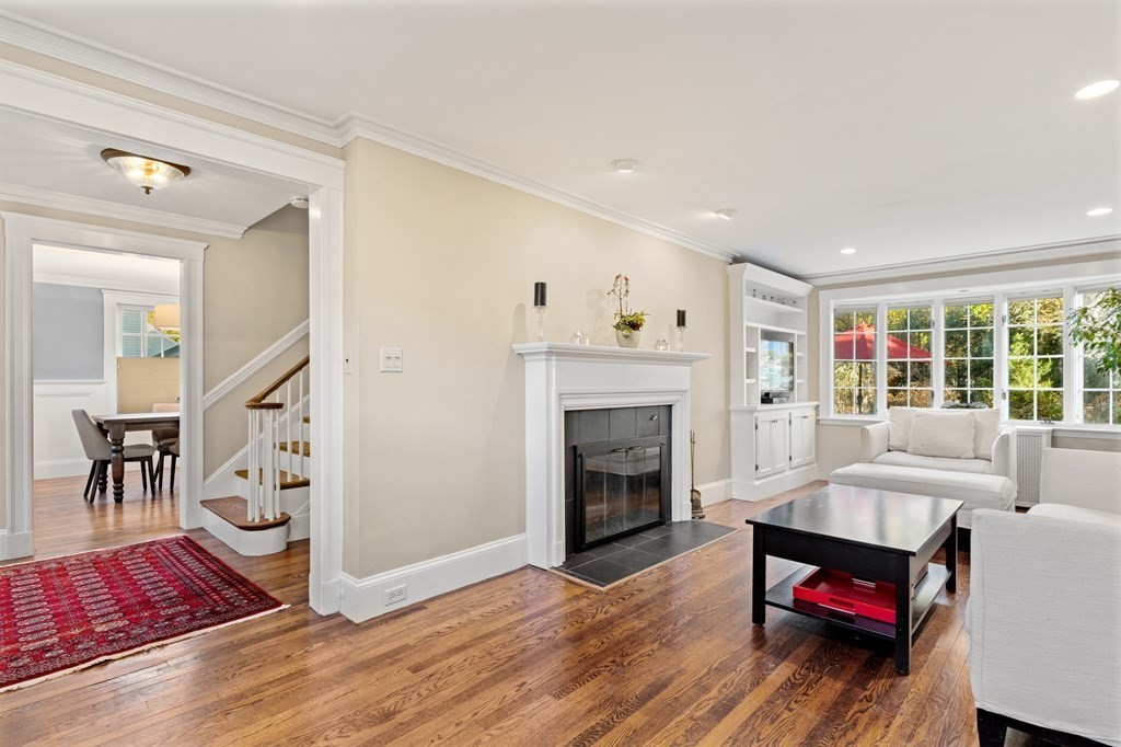 63 Oak Ridge Road Medford, MA 02155 - Photo 11 of 40 a living room with furniture and a fireplace