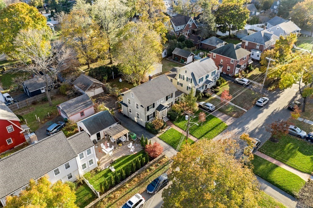 63 Oak Ridge Road Medford, MA 02155 - Photo 26 of 40 an aerial view of multiple houses with yard