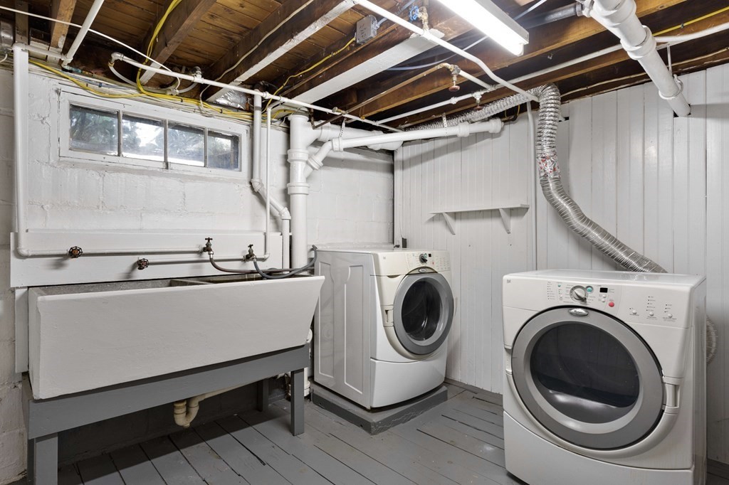 63 Oak Ridge Road Medford, MA 02155 - Photo 33 of 40 a utility room with dryer and washer