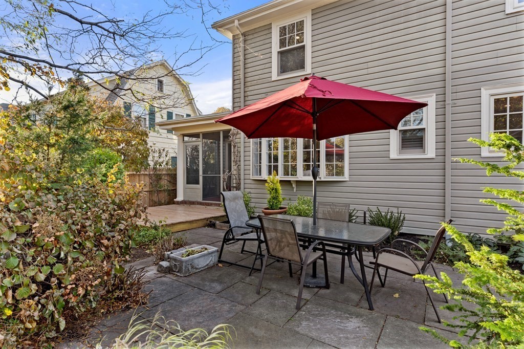 63 Oak Ridge Road Medford, MA 02155 - Photo 8 of 40 a view of a house with a yard and sitting area