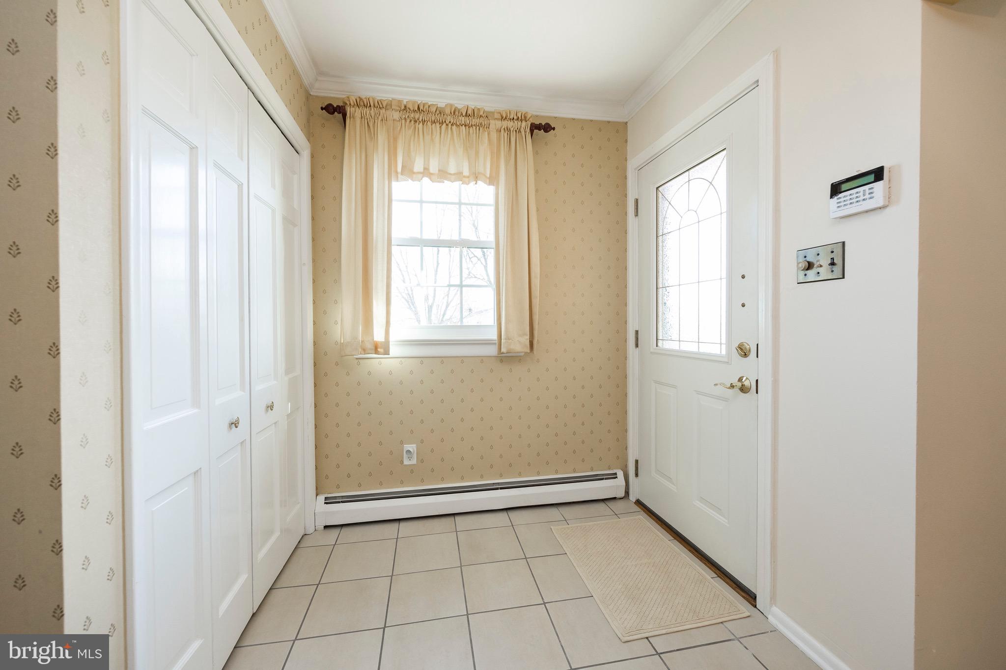 629 Manchester Road East Norriton, PA 19403 - Photo 6 of 76 Entry foyer with ceramic tile and coat closet
