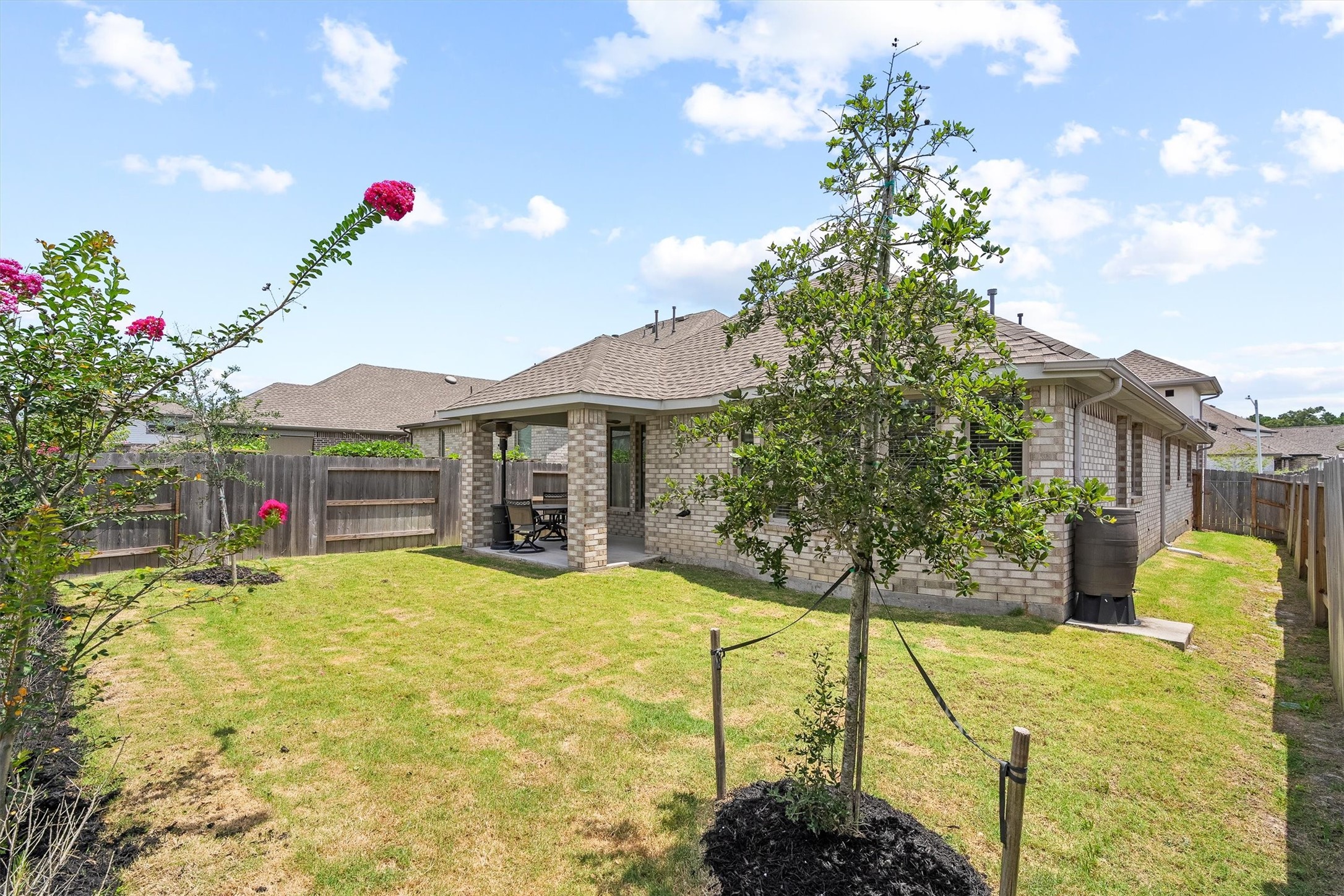 17270 Wild Watermelon Way Conroe, TX 77302 - Photo 25 of 28 A generous fenced backyard with open sky.