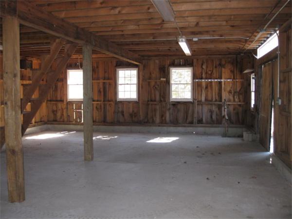 120 Rocky Hill Road Scituate, RI 02857 - Photo 13 of 14 a view of a livingroom with wooden floor and window