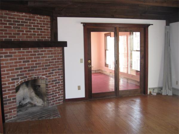 120 Rocky Hill Road Scituate, RI 02857 - Photo 2 of 14 a view of an empty room with wooden floor and a window
