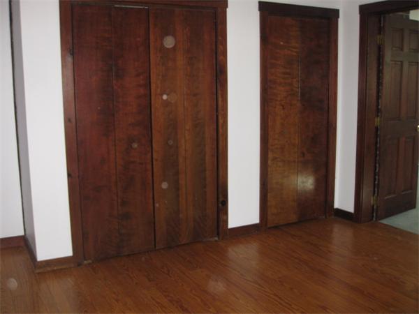120 Rocky Hill Road Scituate, RI 02857 - Photo 8 of 14 an empty room with wooden floor and closet